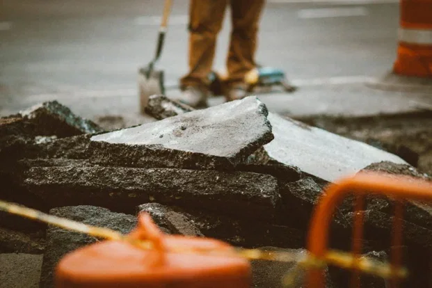 Broken concrete pieces during demolition and removal