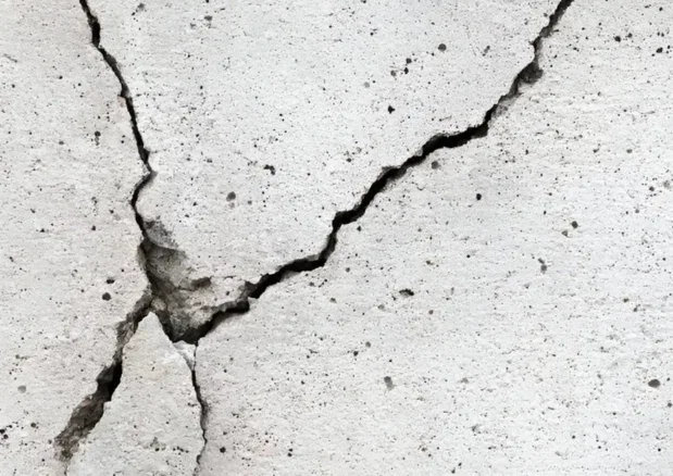 Cracks and broken edges in a concrete slab